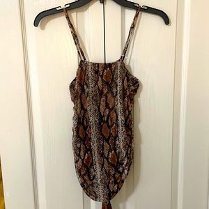 Mesh snakeskin body suit